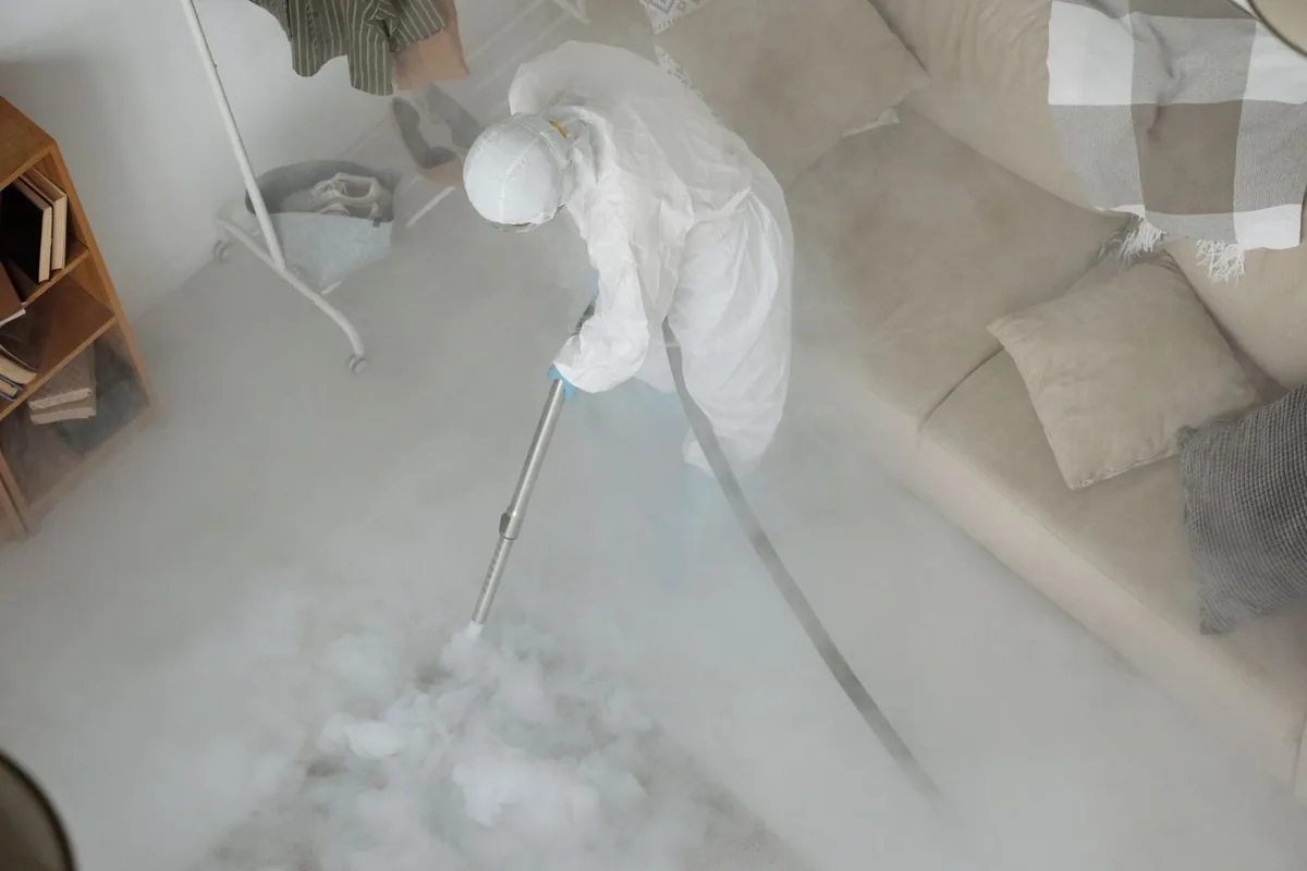 Biohazard cleanup technician in protective equipment, Crossroads, St. Petersburg, FL